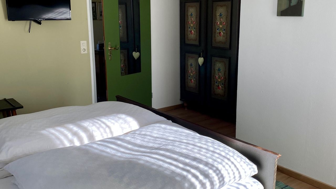 Ferienwohnung Wendelstein Schlafzimmer mit Doppelbett Ferienwohnung Wendelstein Schlafzimmer mit Doppelbett